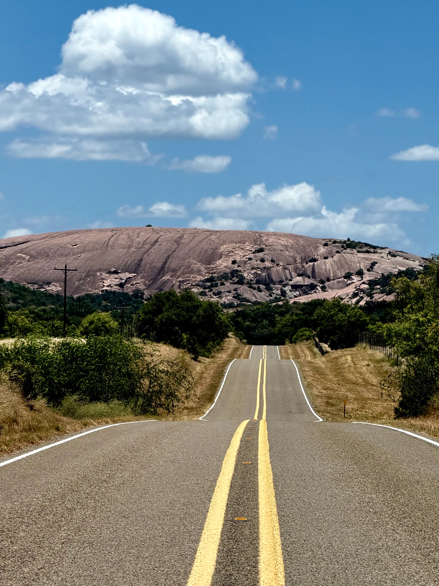Highway leading toward Enchanted Rock in the Texas Hill Country