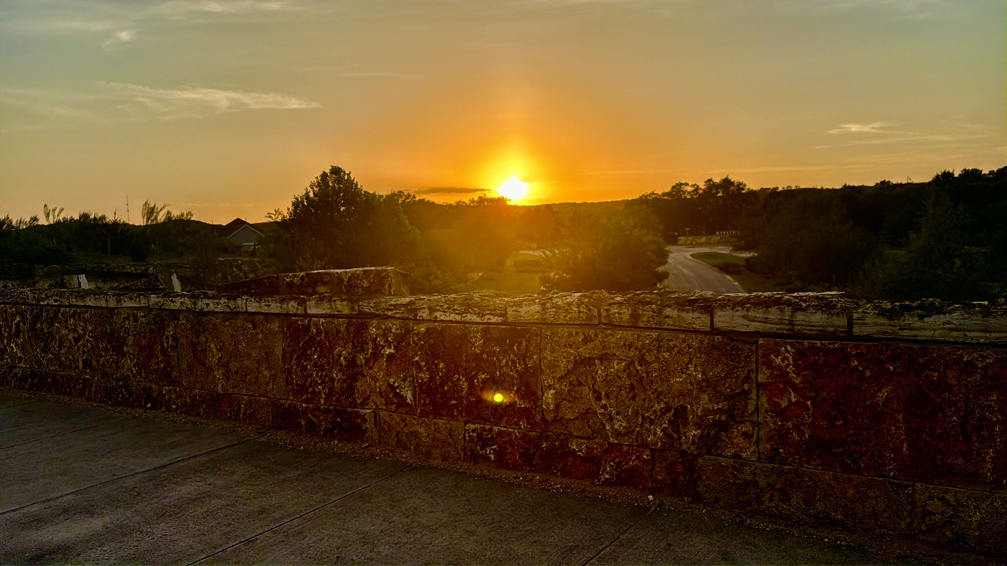 Sunset over the local Hill Country community